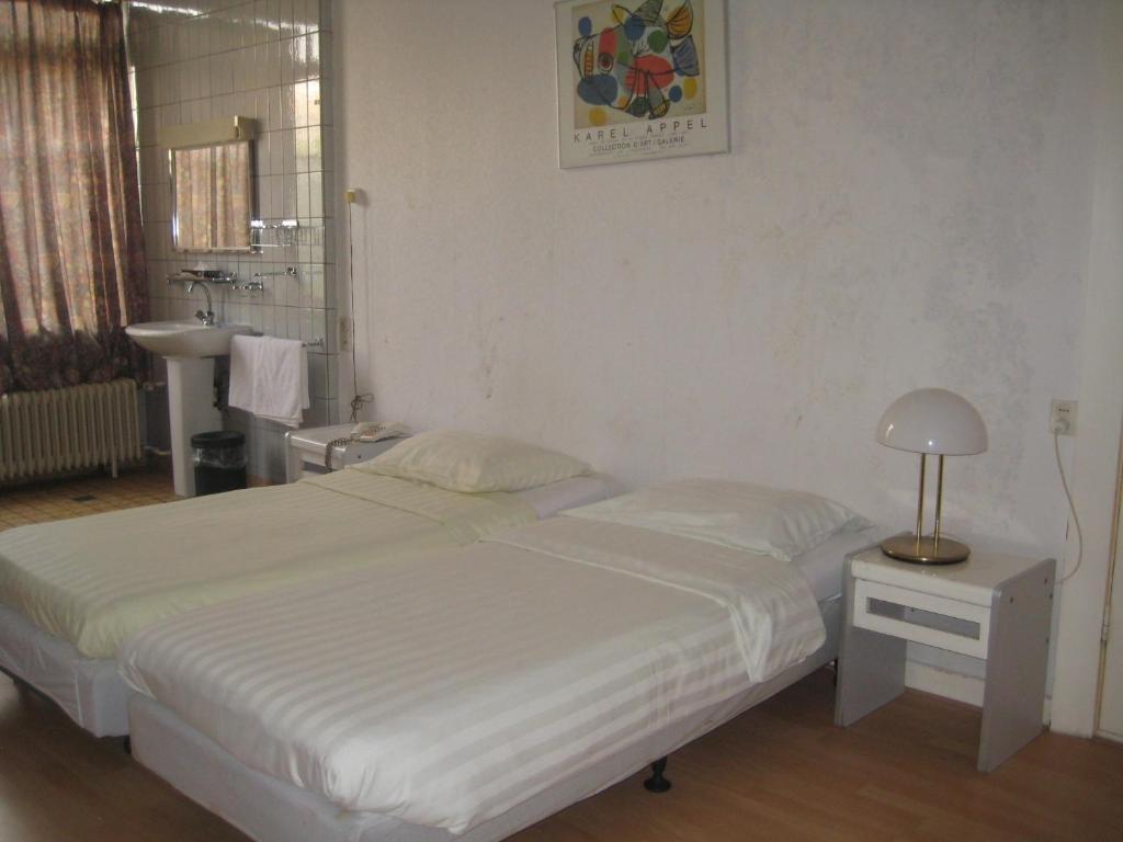 Floris Hotel Roterdão Quarto foto