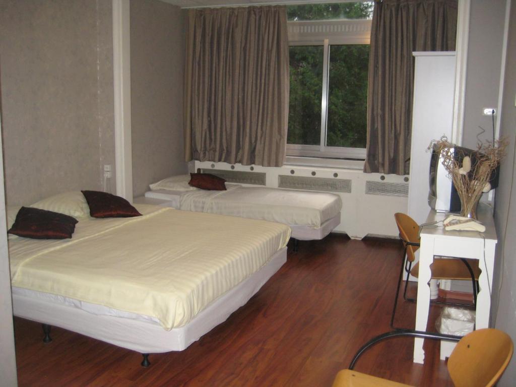 Floris Hotel Roterdão Quarto foto